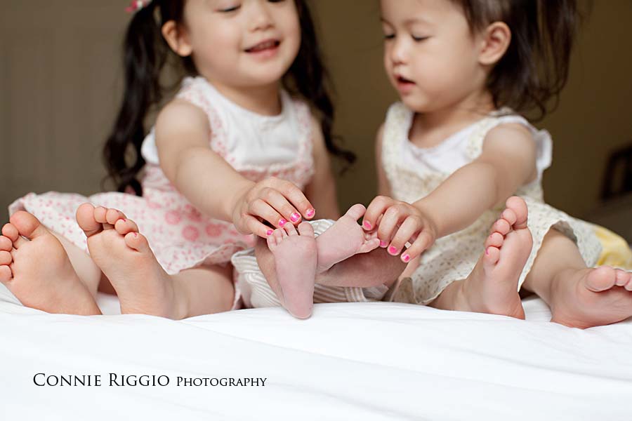 Playing with toes Tacoma Newborn Family Photographer