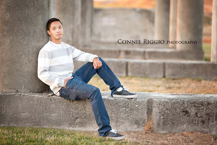 Sitting by pillars Steilacoom Tacoma Seattle Senior Photographer