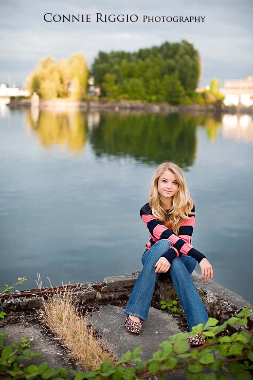 Sitting at water edge Tacoma Best Senior Photographer