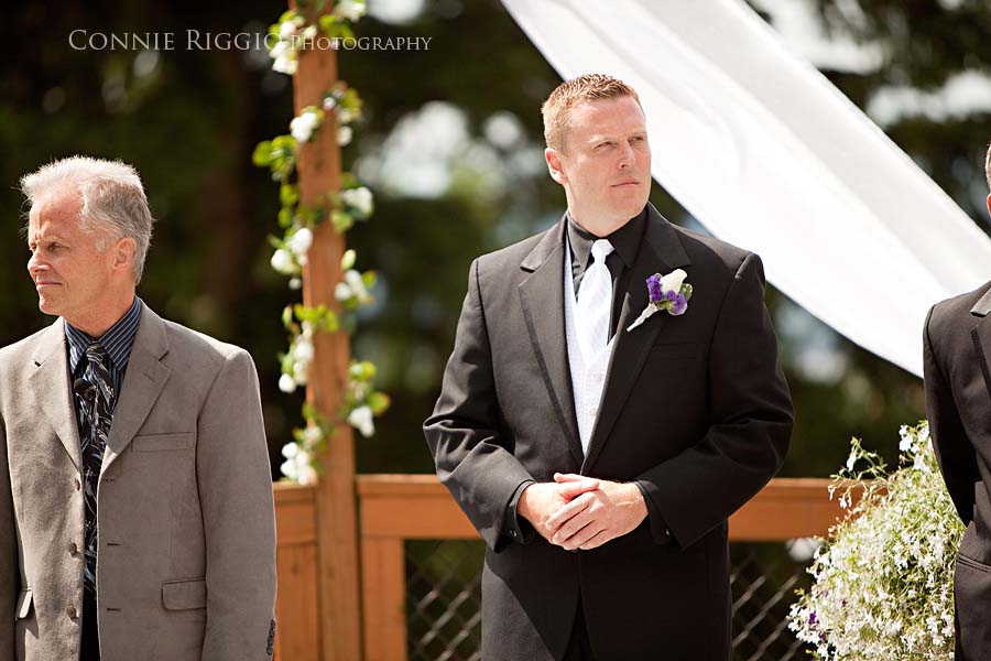 Carson looking at Beth walking with Dad Tacoma Wedding Photographer