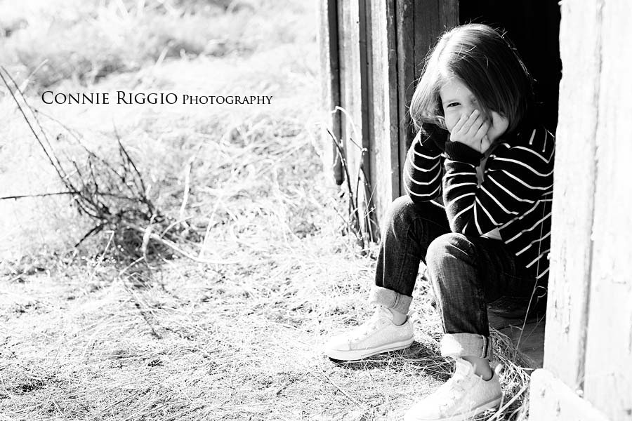 bw Peyton in doorway Tacoma Orting Family Photographer