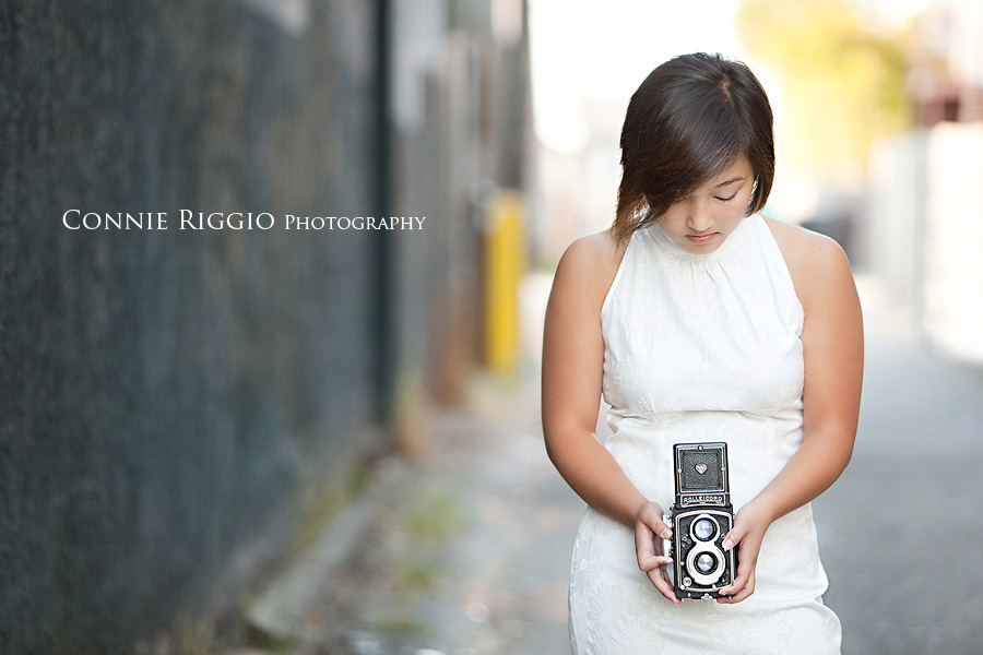 Looking down at camera Tacoma Seattle Artistic Senior Portrait Photographer