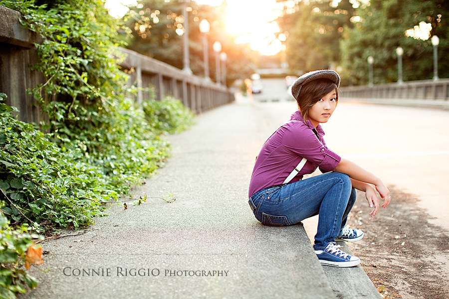 Sitting on curb Tacoma Seattle Artistic Senior Portrait Photographer