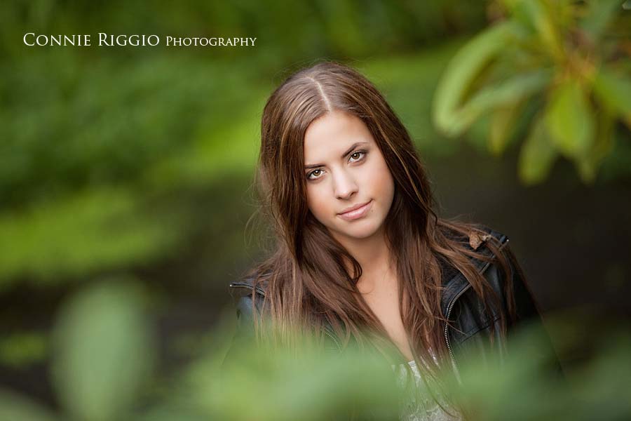 Peeking thru brush Tacoma Senior Portraits