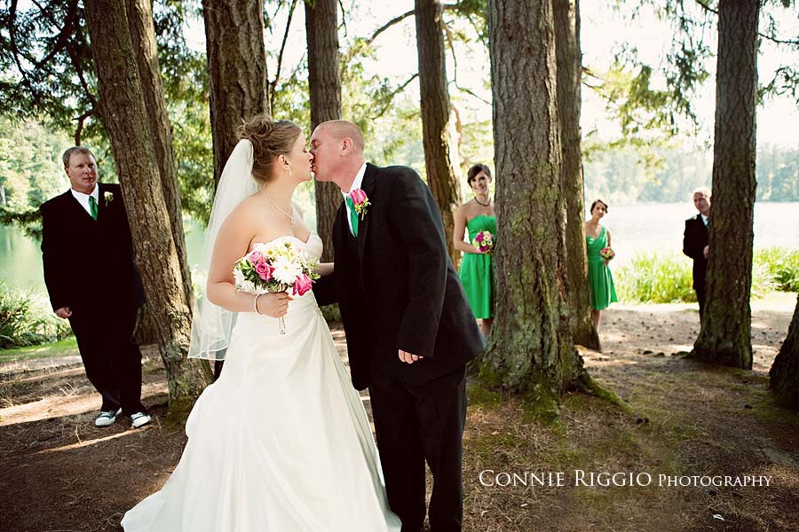Kissing in woods Tacoma Seattle Wedding Photographer