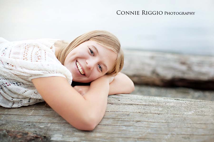 Laying on the log Bellarmine Tacoma Senior Portraits